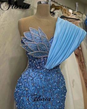 Koktel haljine na bliskom istoku plave boje 